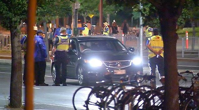 Olympic Boulevard at Melbourne Park was shut down as police conducted safety checks after a woman was indecently assaulted at the Australian Open. Picture: 7 News