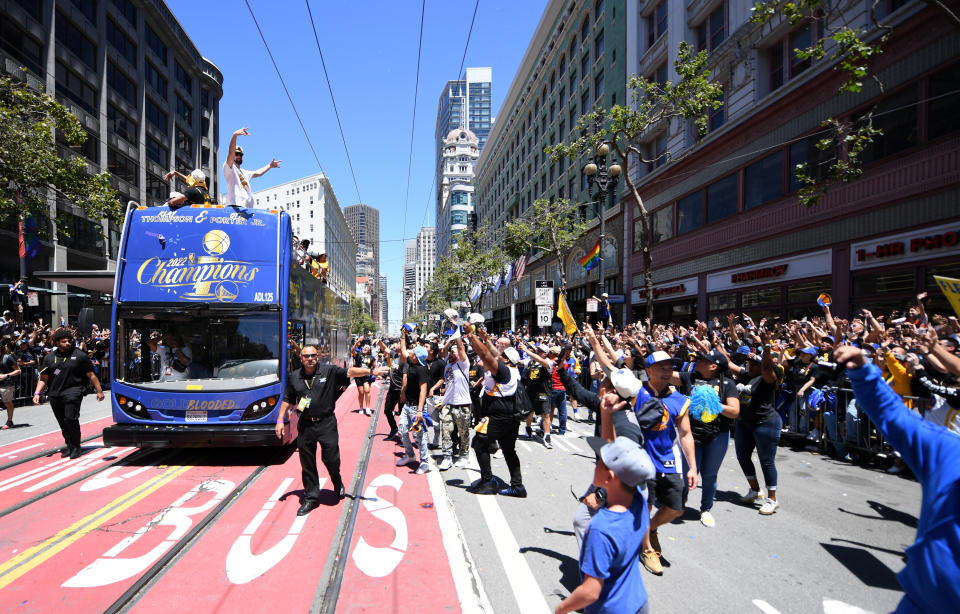 SAN FRANCISCO, CALIFORNIA - JUNE 20: Klay Thompson #11 of the Golden State Warriors celebrates with the crowd during the Victory Parade on June 20, 2022 in San Francisco, California. The Golden State Warriors beat the Boston Celtics 4-2 to win the 2022 NBA Finals. NOTE TO USER: User expressly acknowledges and agrees that, by downloading and or using this photograph, User is consenting to the terms and conditions of the Getty Images License Agreement. (Photo by Michael Urakami/Getty Images)