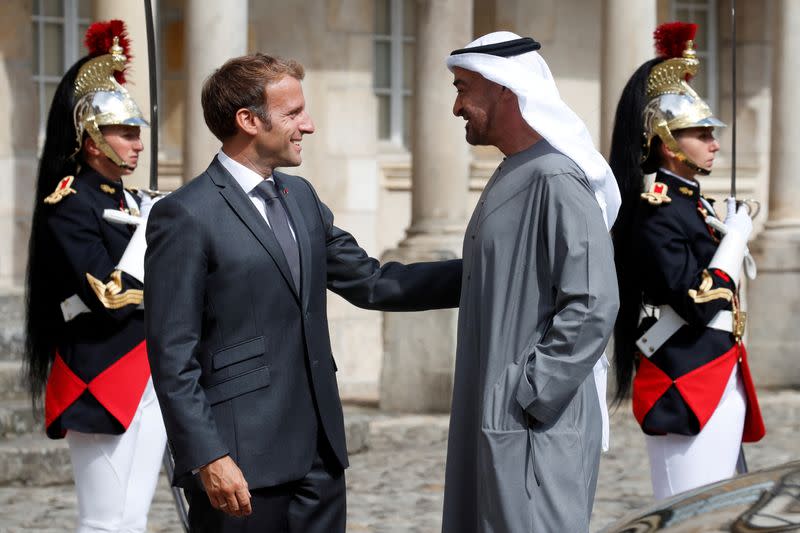 FILE PHOTO: French President Emmanuel Macron meets Abu Dhabi's Crown Prince Sheikh Mohammed bin Zayed al-Nahyan in Fontainebleau