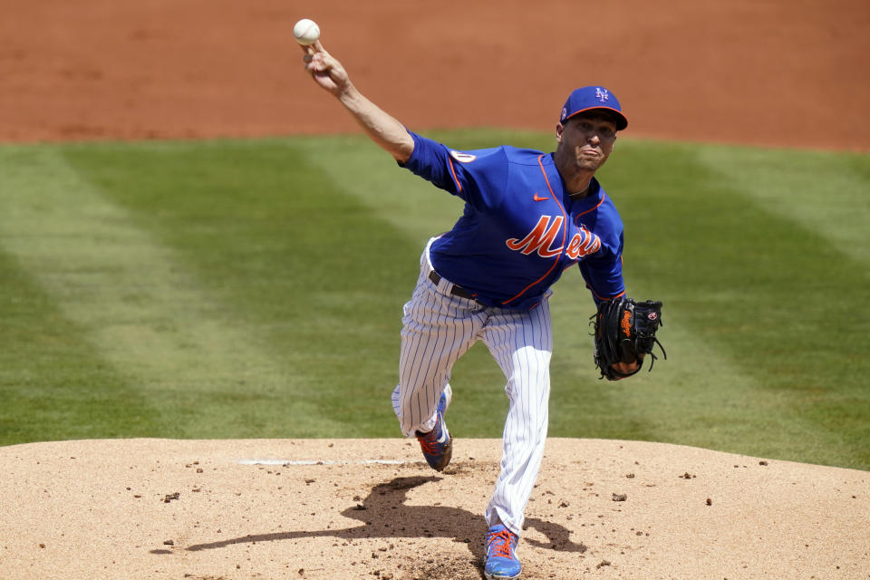 New York Mets starting pitcher Jacob deGrom throws during the first inning of a spring training baseball game against the Houston Astros, Tuesday, March 16, 2021, in Port St. Lucie, Fla. (AP Photo/Lynne Sladky)