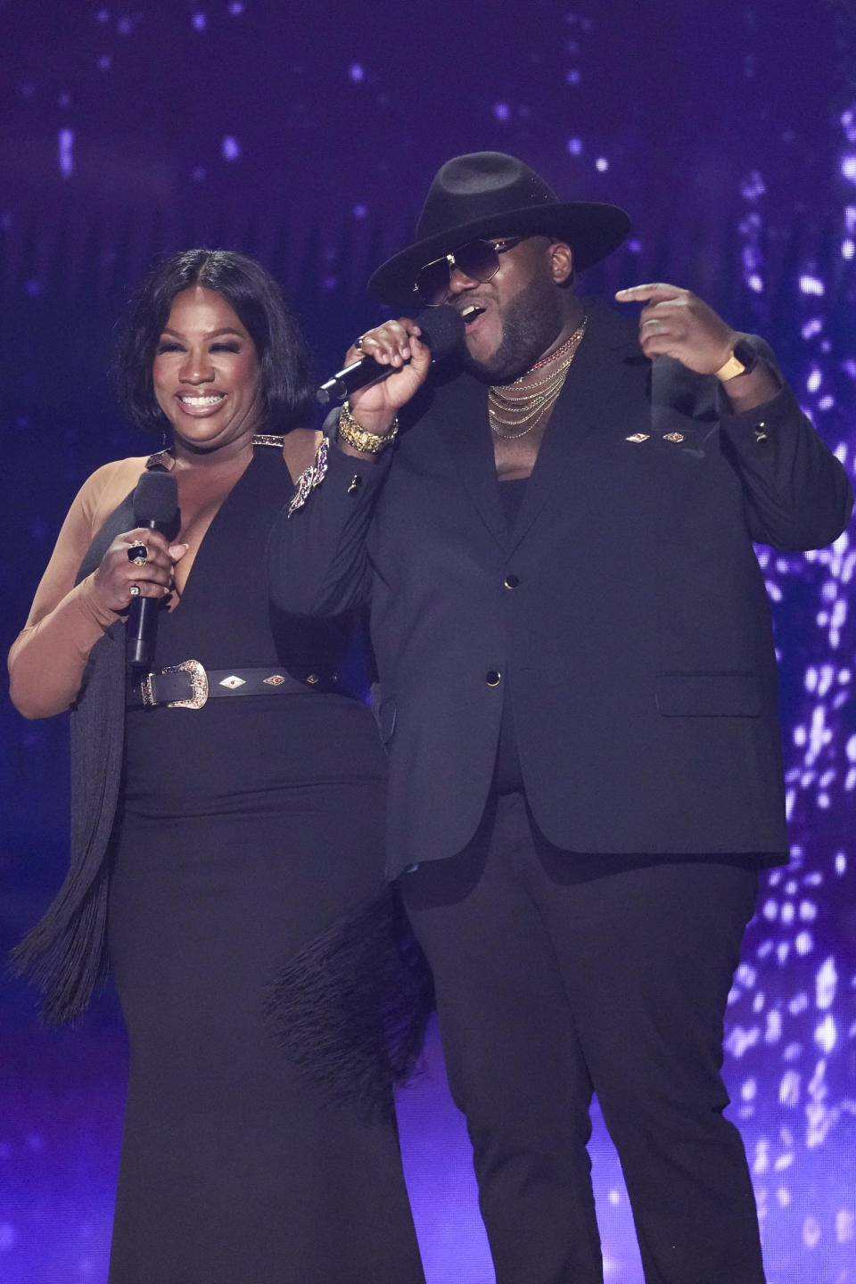 Tanya Trotter, left, and Michael Trotter Jr. of The War and Treaty introduce a performance by Kane Brown during the 59th annual Academy of Country Music Awards on Thursday, May 16, 2024, at the Ford Center in Frisco, Texas. (AP Photo/Chris Pizzello)