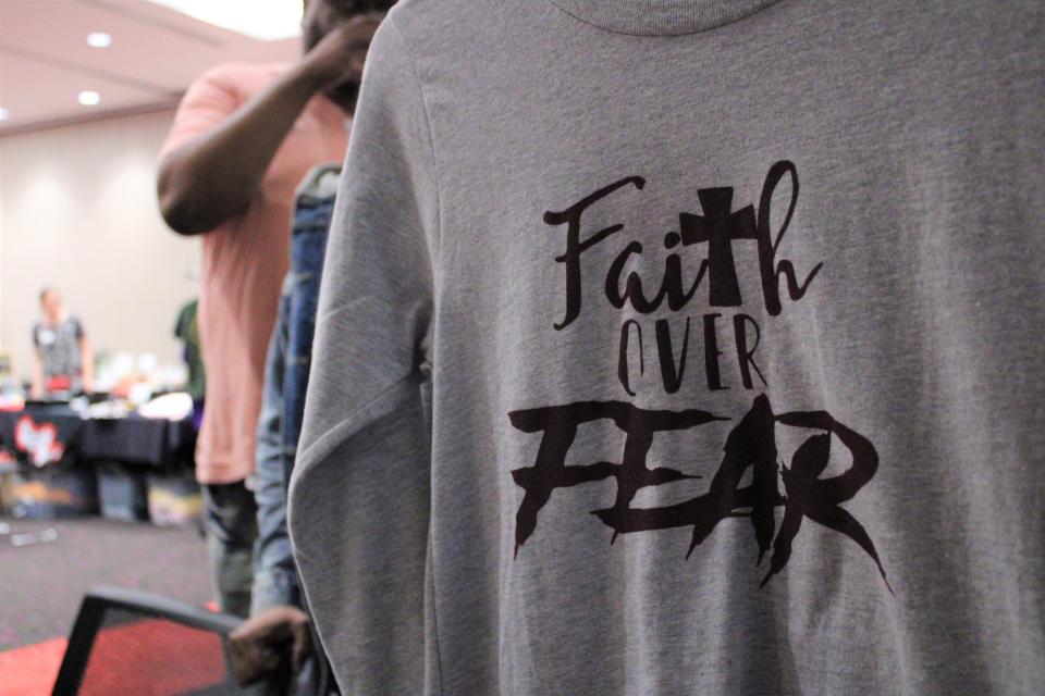 Faith over Fear is one of the phrases printed on the shirts of God's Purpose Apparel.