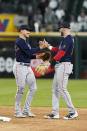 Boston Red Sox's Enrique Hernandez, left, and Trevor Story celebrate the team's 16-3 win over the Chicago White Sox in a baseball game Tuesday, May 24, 2022, in Chicago. (AP Photo/Charles Rex Arbogast)