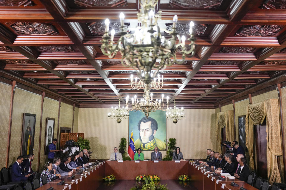 Venezuelan leaders, from center left, Attorney General Tarek William Saab, Vice President Delcy Rodriguez, National Assembly President Jorge Rodriguez and Supreme Court President Gladys Gutierrez lead a meeting at the Foreign Ministry in Caracas, Venezuela, Monday, Dec. 11, 2023. Leaders of Guyana and Venezuela are preparing to meet this week to address an escalating dispute over the Essequibo region that is rich in oil and minerals. (AP Photo/Matias Delacroix)