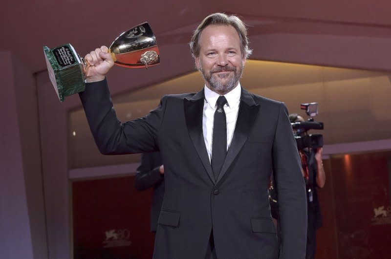 Peter Sarsgaard poses with the Coppa Volpi for Best Actor for the movie "Memory" during the winner's photocall at the 80th Venice International Film Festival on Saturday. Photo by Rocco Spaziani/UPI