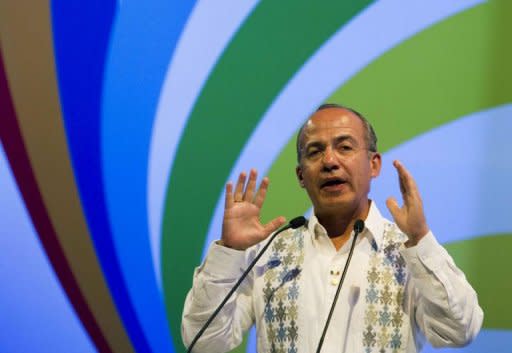 Mexico's President Felipe Calderon delivers a speech during the opening ceremony of the CEO's Summit of the Americas in Cartagena, Colombia