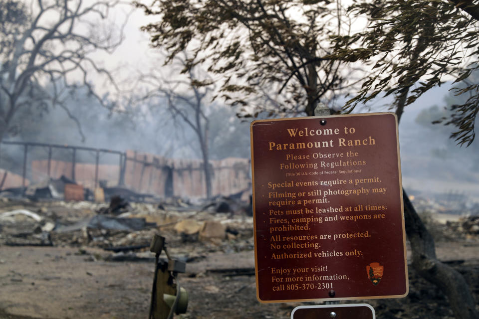 This Friday, Nov. 9, 2018 file photo shows Paramount Ranch, a frontier western town built as a movie set that appeared in countless movies and TV shows, after it was decimated by the Woolsey fire in Agoura Hills, Calif. Southern Californians faced with the loss of lives and homes in a huge wildfire are also grappling with the destruction of public lands popular with hikers, horseback riders and mountain bikers. The Woolsey fire has charred more than 83 percent of National Park Service land within the Santa Monica Mountain National Recreational Area. (AP Photo/Marcio Jose Sanchez)