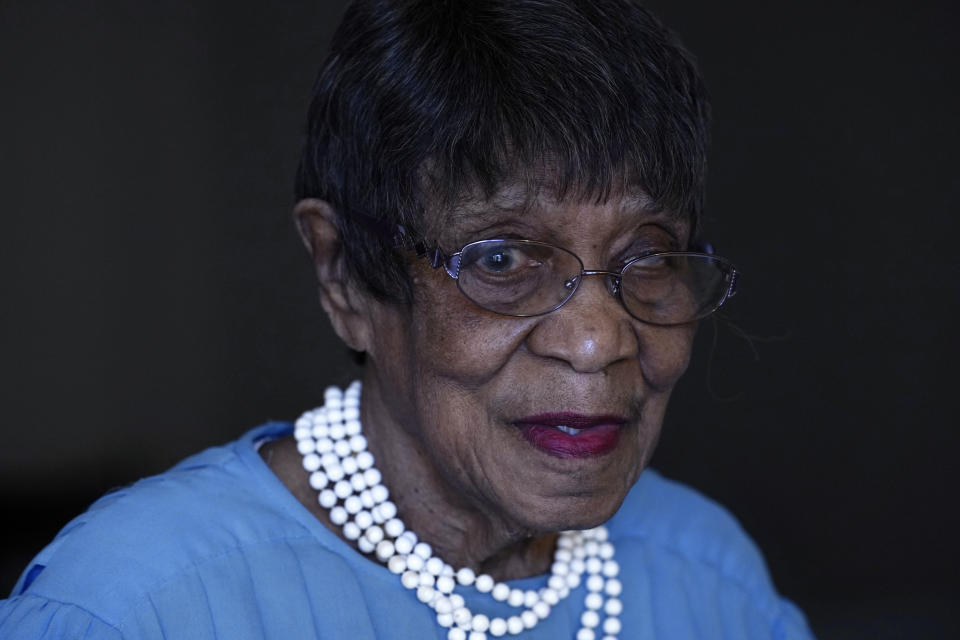 Talu Massey speaks about voting from her home in Detroit, Tuesday, Oct. 27, 2020. Massey is among the millions of Americans who voted prior to Nov. 3, resulting in record-breaking early turnout. But this is far from the Detroit resident's first election. Very far. She voted for FDR, after all. The 103-year-old is proud of her lengthy voting record, saying it's every citizen's "civic duty" to take part in the process. (AP Photo/Paul Sancya)