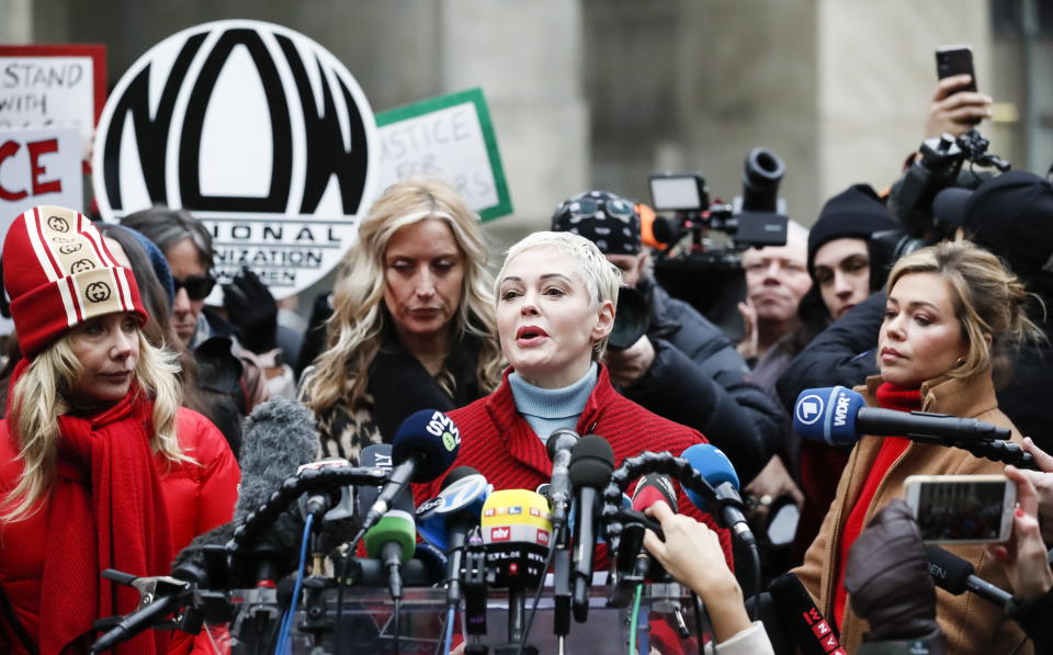 Actress Rose McGowan talks to journalists during a press conference with other women who have all accused former Hollywood producer Harvey Weinstein of sexual assault, including Patricia Arquette and television journalist Lauren Sivan.