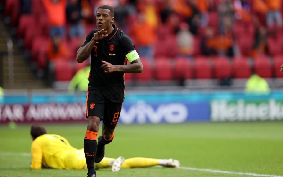 Georginio Wijnaldum of the Netherlands celebrates after scoring his side's 2nd goal during the Euro 2020 soccer championship group F match between North Macedonia and Netherlands, at the Johan Cruyff ArenA in Amsterdam, Netherlands, Monday, June 21 2021.  - AP