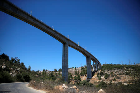 A bridge, part of the tracks of Israel's new high-speed rail line between Jerusalem and Tel Aviv, is seen in the outskirts of Jerusalem September 23, 2018. REUTERS/Ammar Awad