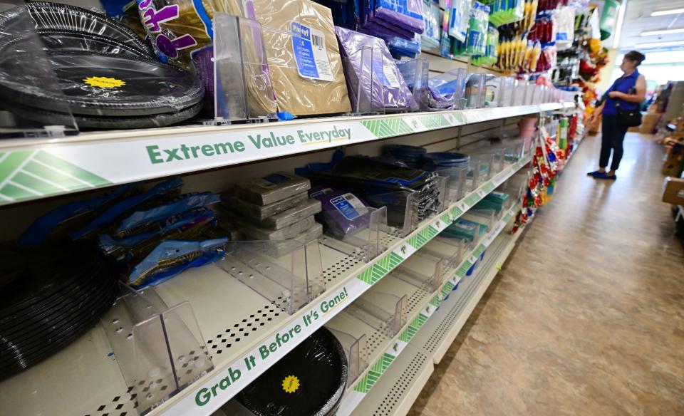 A woman shops at a Dollar Store in Alhambra, California on August 23, 2022. U.S. shoppers have been dealing with higher grocery prices for more than a year because of inflation.