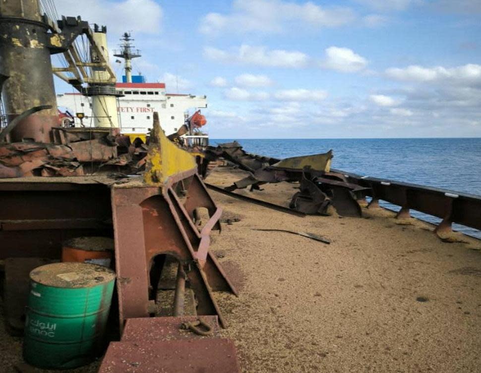 <span>A damaged civilian cargo vessel, carrying wheat grain to Egypt, which was hit by a Russian missile strike after it left the Ukrainian maritime border in the Black Sea.</span><span>Photograph: Ukrainian Presidential Press Service/Reuters</span>