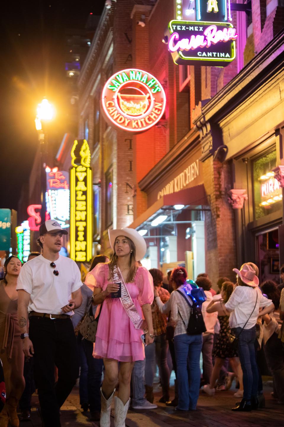 Jacob Dean and James Lopez from El Paso visit Broadway Street celebrating Lopez’s 21st birthday in Nashville, Tenn., Wednesday, March 13, 2024.