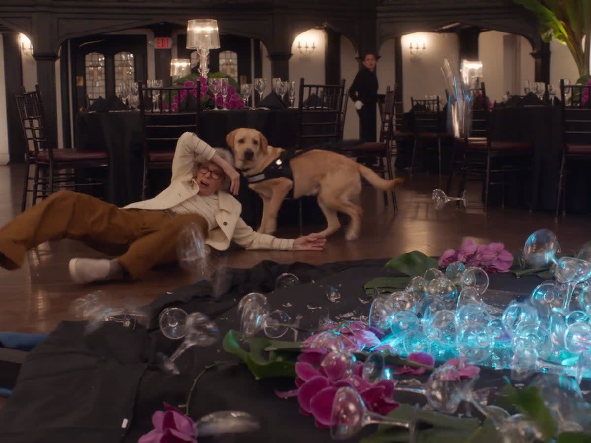 Keaton, playing a blind woman on a blind date, moments after colliding into a tower of glasses in the 2020 straight-to-plane comedy ‘Love, Weddings and Other Disasters’ (Saban Films)