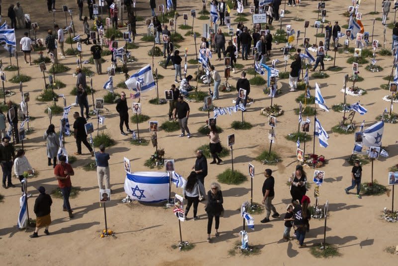 An aerial view shows the scope of the memorial to the Israelis killed in the Nova dance party in Re'im, southern Israel, near the border with the Gaza Strip. The memorial displays photographs, flowers and personal items of the 325 Israeli slaughtered and the dozens kidnapped by Hamas terrorists on October 7, 2023. Photo by Jim Hollander/UPI