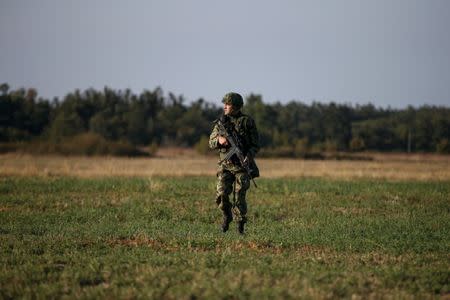 A member of joint units of Serbian military and police patrols near the Serbian-Bulgarian border near the town of Zajecar, Serbia, September 27, 2016. REUTERS/Marko Djurica
