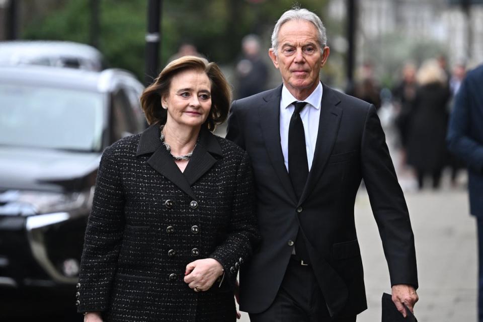 Tony Blair and his wife, Cherie Blair, attend the funeral of Derek Draper on 2 February (Getty Images)