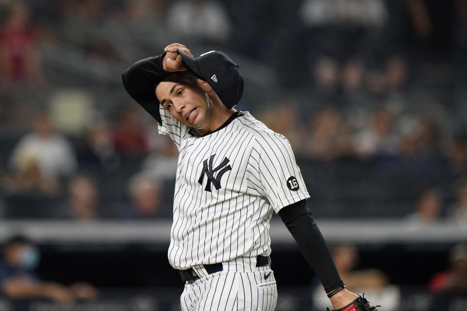 New York Yankees relief pitcher Luis Cessa (85) reacts coming off the mound after allowing a go-ahead, two-run single to Boston Red Sox's Xander Bogaerts in the 10th inning of a baseball game, Sunday, June 6, 2021, at Yankee Stadium in New York. The Red Sox defeated the Yankees 6-5 in 10 innings. (AP Photo/Kathy Willens)