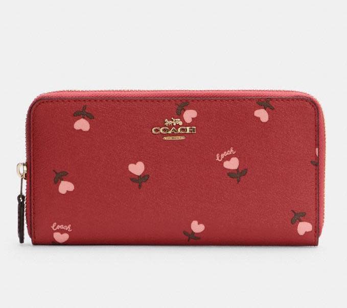 Accordion Zip Wallet With Heart Floral Print. Image via Coach Outlet.