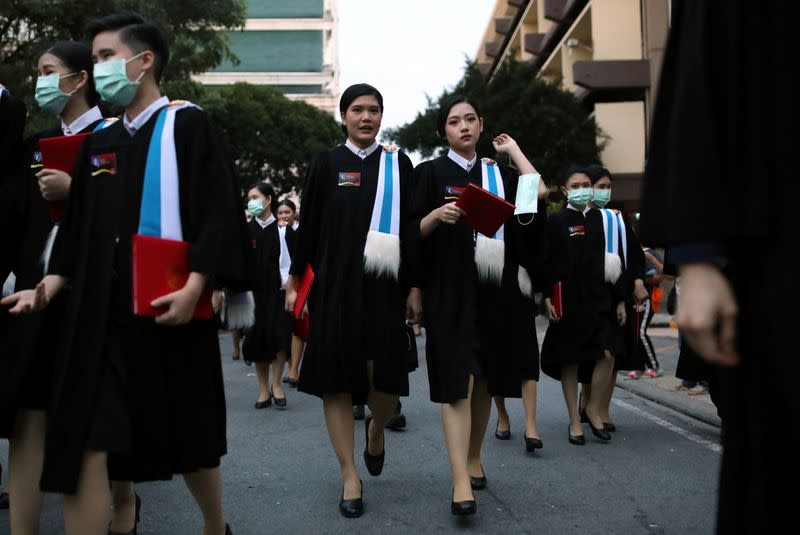 Students attend their graduation ceremony led by King Maha Vajiralongkorn, at Thammasat University in Bangkok