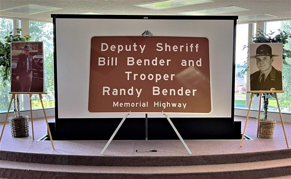 The Ohio Department of Transportation will install these memorial signs honoring Deputy Bill Bender and Trooper Randy Bender along Ohio 309 between Marion-Williamsport and Holland roads west of Marion. Photographs of the Benders were included in a display set up for the dedication ceremony on Friday, July 15, 2022, at the Marion County Sheriff's Office.