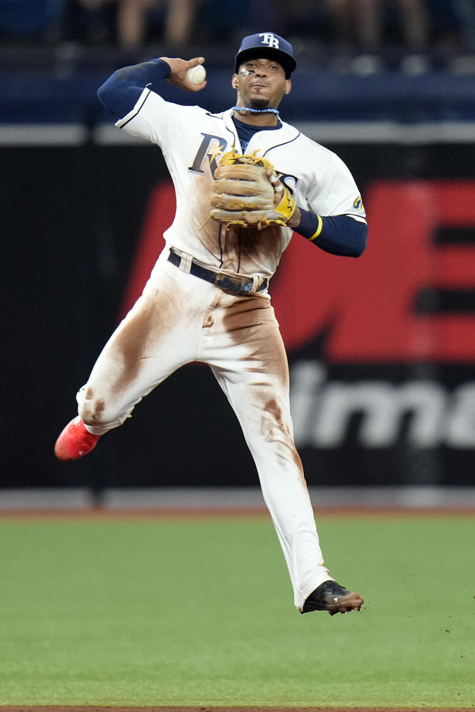 Tampa Bay Rays shortstop Wander Franco leaps high in the air as he throws out St. Louis Cardinals' Tommy Edman at first base during the fifth inning of a baseball game Thursday, Aug. 10, 2023, in St. Petersburg, Fla. (AP Photo/Chris O'Meara)