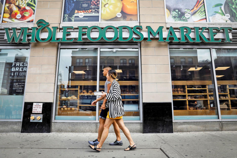 It's not quite as efficient as a drive-through, but Amazon's Whole Foods