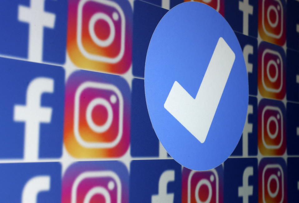 A blue verification badge and the logos of Facebook and Instagram are seen in this picture illustration taken January 19, 2023. REUTERS/Dado Ruvic/Illustration