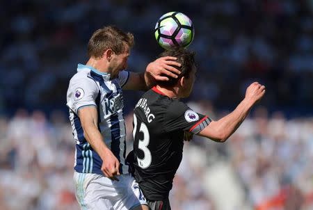 Britain Football Soccer - West Bromwich Albion v Southampton - Premier League - The Hawthorns - 8/4/17 West Bromwich Albion's Craig Dawson in action with Southampton's Pierre-Emile Hojbjerg Reuters / Anthony Devlin Livepic