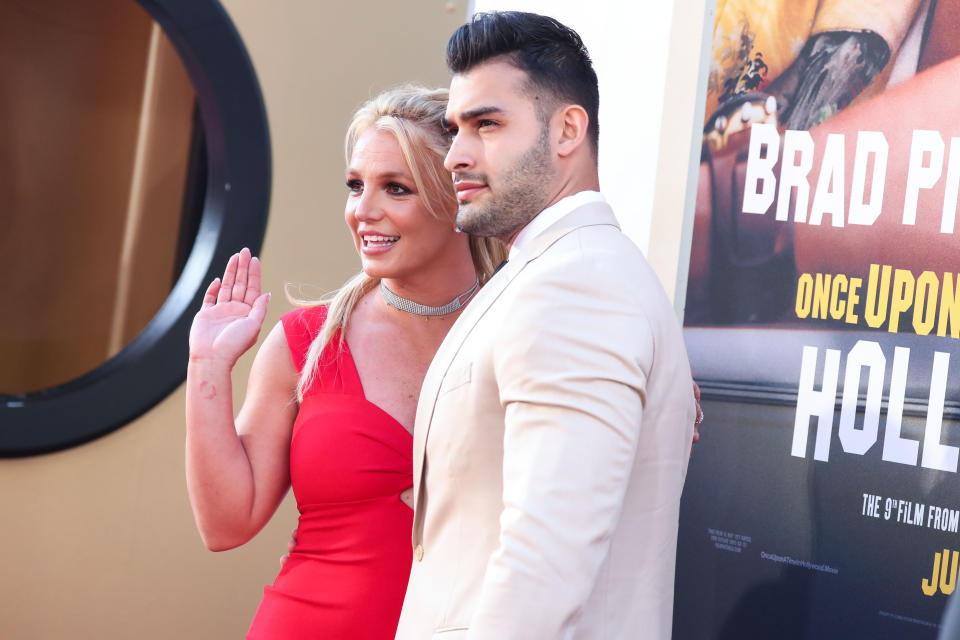 HOLLYWOOD, LOS ANGELES, CALIFORNIA, USA - JULY 22: Singer Britney Spears and boyfriend Sam Asghari arrive at the World Premiere Of Sony Pictures' 'Once Upon a Time In Hollywood' held at the TCL Chinese Theatre IMAX on July 22, 2019 in Hollywood, Los Angeles, California, United States. (Photo by Xavier Collin/Image Press Agency/Sipa USA)