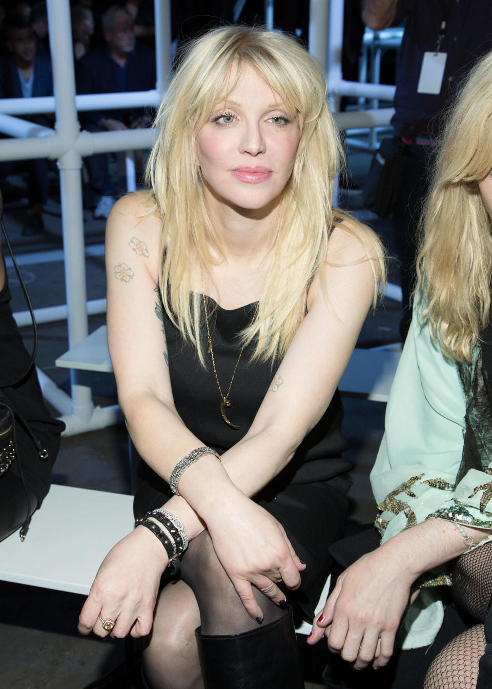 Courtney Love attends the Alexander Wang collection on Saturday, Sept. 7, 2012, during Mercedes-Benz Fashion Week in New York. (Photo by Dario Cantatore/Invision/AP)