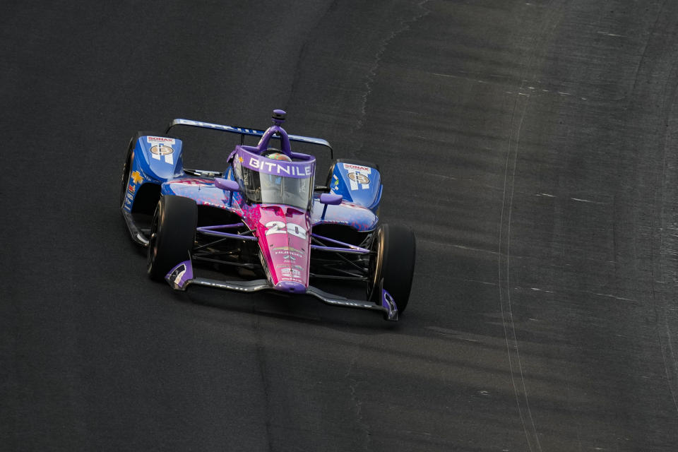 Conor Daly heads into the first turn during practice for the Indianapolis 500 auto race at Indianapolis Motor Speedway in Indianapolis, Friday, May 18, 2023. (AP Photo/Michael Conroy)