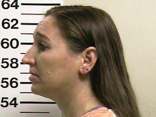 This photo released by the Utah County Jail shows the mugshot of Megan Huntsman, who was booked into the Utah County jail on suspicion of killing her newborn children over the past decade. (AP Photo/Utah County Jail)