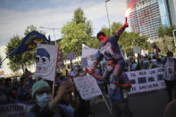 Striking ICU nurses demonstrate in Marseille, southern France, Tuesday, May, 11, 2021 to demand better pay and working conditions as the government gradually reopen the country. (AP Photo/Daniel Cole)