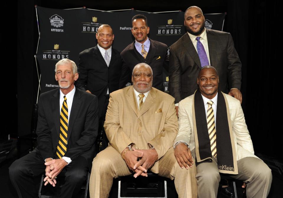 Clockwise from top left, defensive back Aeneas Williams, wide receiver Andre Reed, offensive tackle Walter Jones, linebacker Derrick Brooks , defensive lineman Claude Humphrey and punter Ray Guy pose for a photo at the NFL Honors show Saturday, Feb. 1, 2014 at Radio City Music Hall in New York. (Photo by Frank Micelotta/Invision for NFL/AP Images)