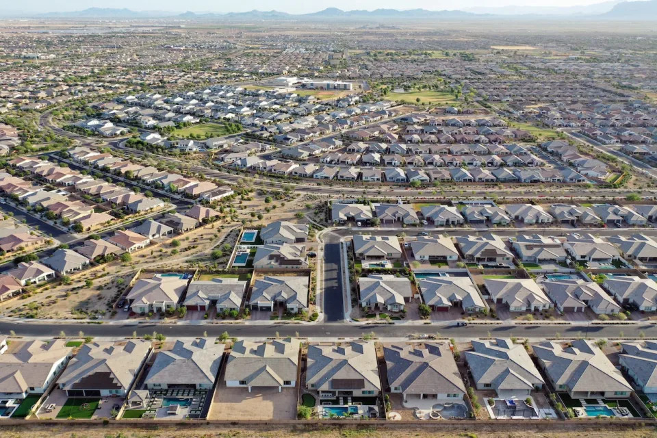 An aerial view of homes in the Phoenix suburbs on June 9, 2023 in Queen Creek, Arizona.