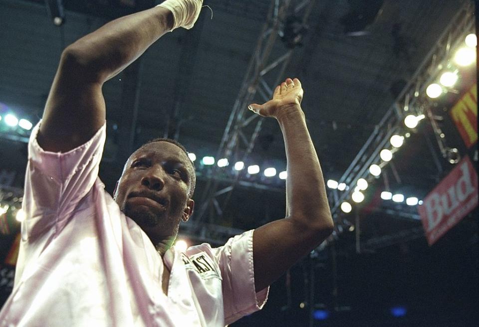 12 Apr 1997: Pernell Whitaker holds up his arms at the Thomas and Mack Center in Las Vegas, Nevada. De La Hoya won the fight by decision. Mandatory Credit: Jed Jacobsohn /Allsport