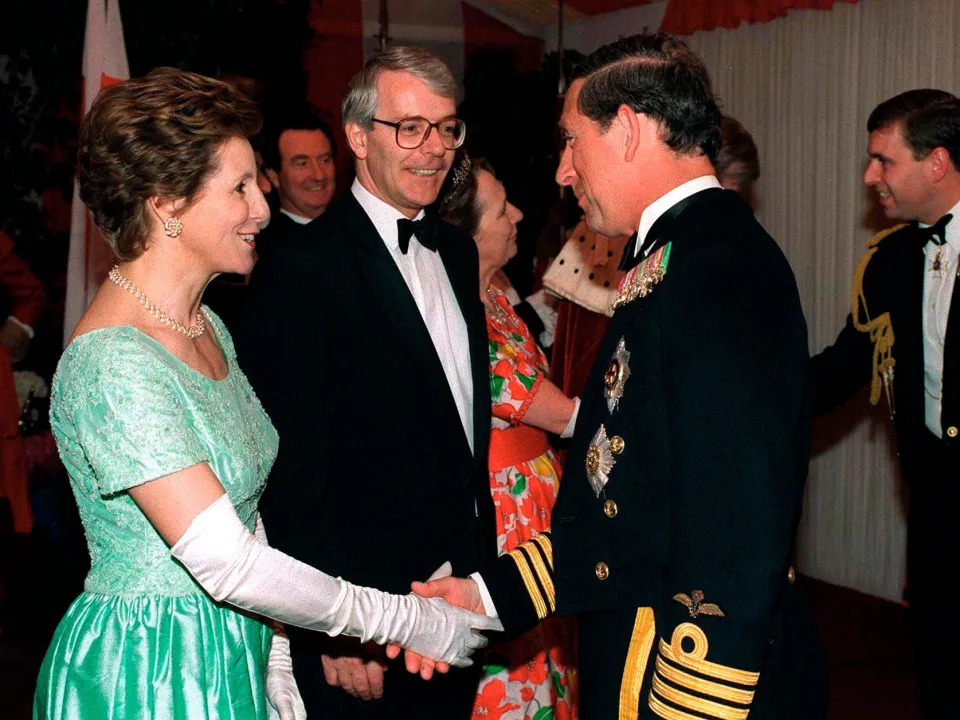 Heads Of State Banquet At Guildhall, London To Commemorate 50th Anniversary Of End Of War In Europe. Prince Charles Is Greeted By Prime Minister John Major And Wife Norma.