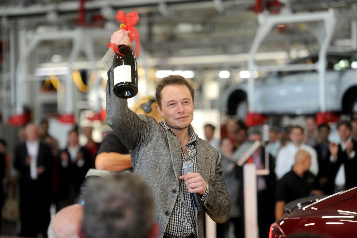Elon Musk with champagne