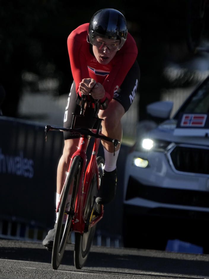 Norway's Soren Waerenskjold competes in the men's under 23 individual time trial at the world road cycling championships in Wollongong, Australia, Monday, Sept. 19, 2022. (AP Photo/Rick Rycroft)