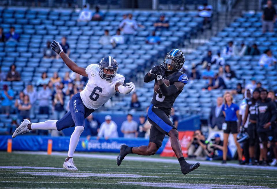 Georgia Southern's NaJee Thompson (6) get his hand on a pass, causing it to fall incomplete to a Georgia State receiver in the fourth quarter on Saturday at Center Parc Stadium in Atlanta.