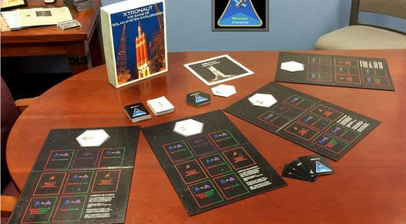 Xtronaut, which comes with everything you see here, aims to teach gamers seven and up about the technical and political hurdles involved with exploring the solar system. And also to raise an education and public outreach budget for NASA's Osiri