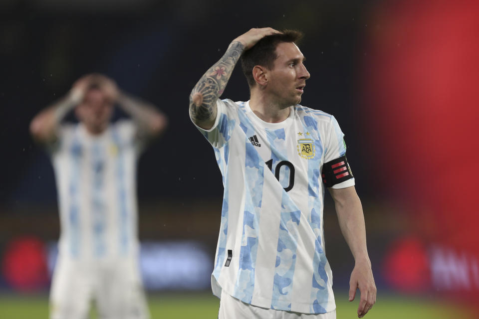 Argentina's Lionel Messi gestures during a qualifying soccer match for the FIFA World Cup Qatar 2022 against Colombia at the Metropolitano stadium in Barranquilla, Colombia, Tuesday, June 8, 2021. Miguel Borja scored an equalizer for Colombia in the last seconds of added time against Argentina in one of the best matches yet in South American qualifying. (AP Photo/Fernando Vergara)