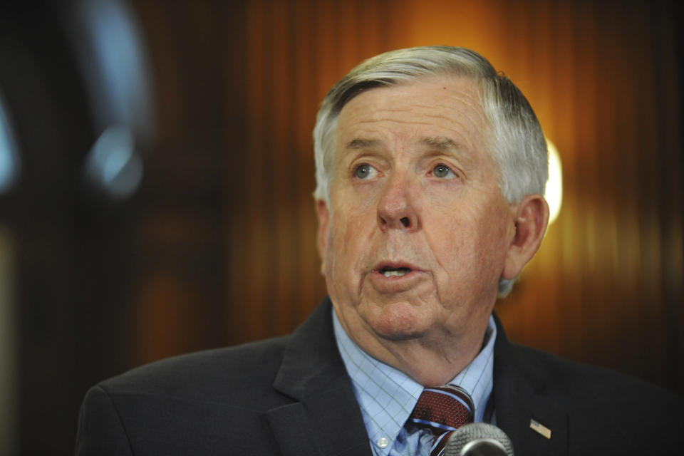 FILE - In this May 29, 2019 file photo, Missouri Gov. Mike Parson addresses the media during a news conference in his Capitol office in Jefferson City, Mo. Republican Gov. Parson continues to weigh a clemency request for Russell Bucklew, who is scheduled to die at 6 p.m. CDT Tuesday, Oct. 1, 2019, for killing a southeast Missouri man in 1996. Bucklew suffers from a rare medical condition that causes head, neck and throat tumors. His attorneys warn that the execution process could cause the throat tumors to burst, causing Bucklew to suffer as he dies. (Julie Smith/The Jefferson City News-Tribune via AP, File)