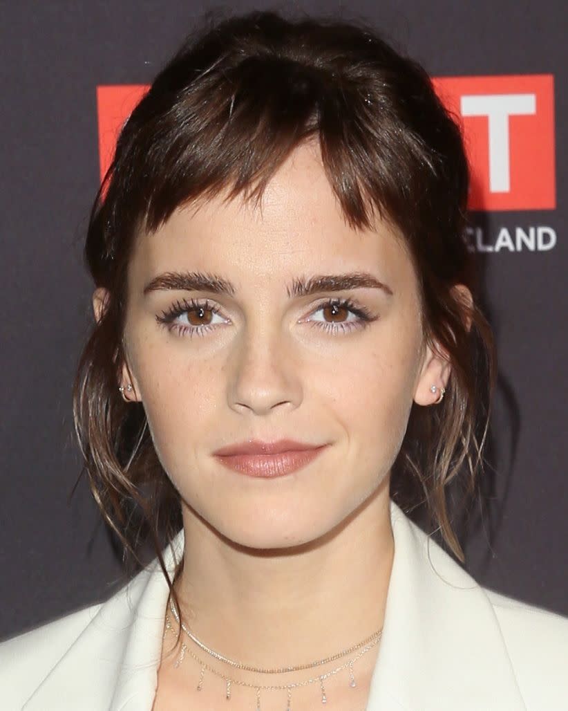 <p>Emma Watson unveiled a new dark brown hair colour and a super short choppy micro fringe as her hair style of choice.</p>