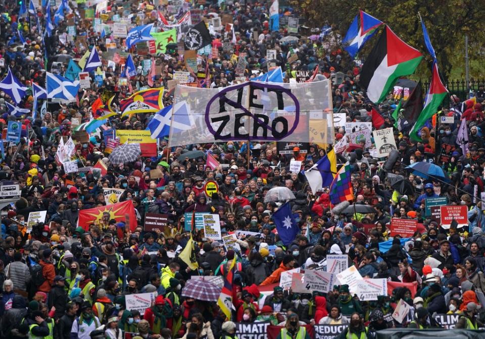 Protesters in a rally organised by the Cop26 Coalition in Glasgow demanding global climate justice on Saturday  (PA)