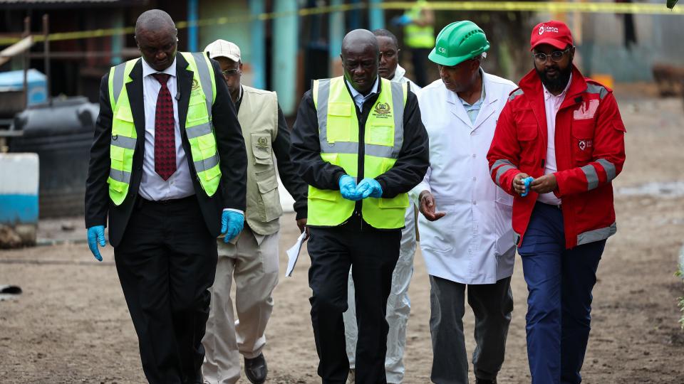 Kenya's Deputy President Rigathi Gachagua and other officials walk at a school 