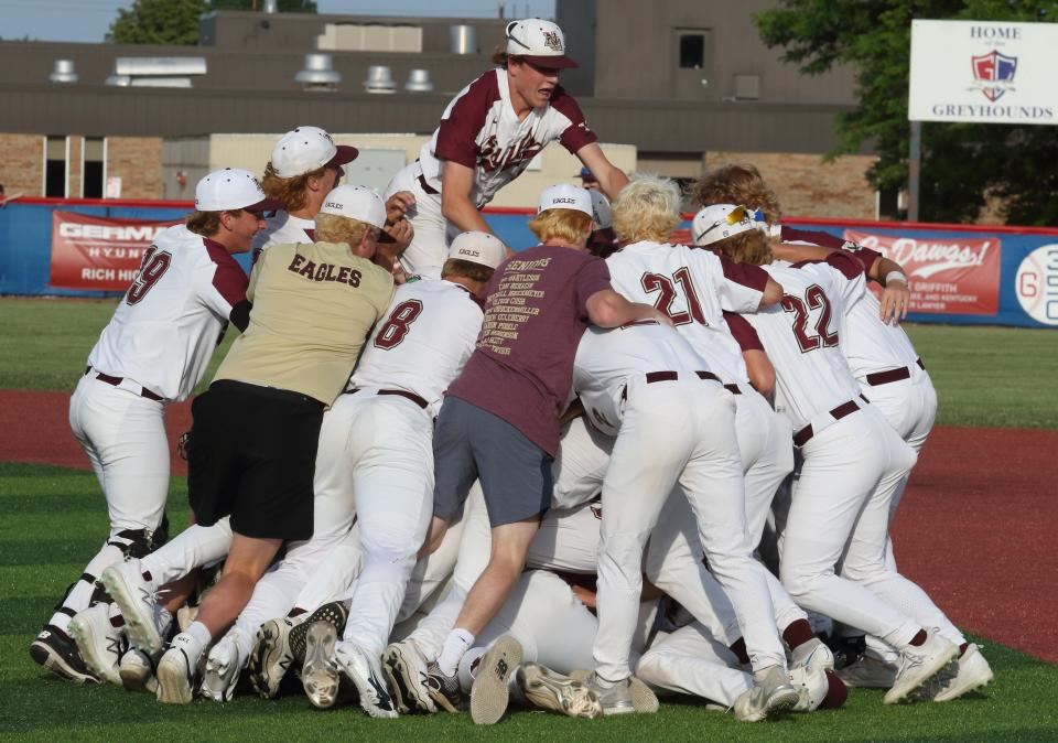 New Albany celebrates its 2-1 Division I district final win over Canal Winchester on May 25 at Grove City.