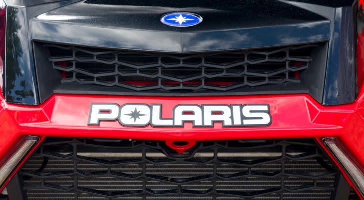 A close-up shot of a Polaris (PII) all terrain vehicle.